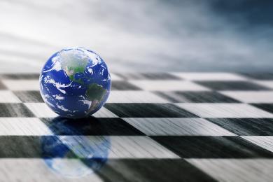globe pictured on top of a chessboard